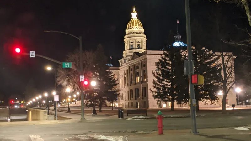 Wyoming State Capitol illuminated at night in Cheyenne