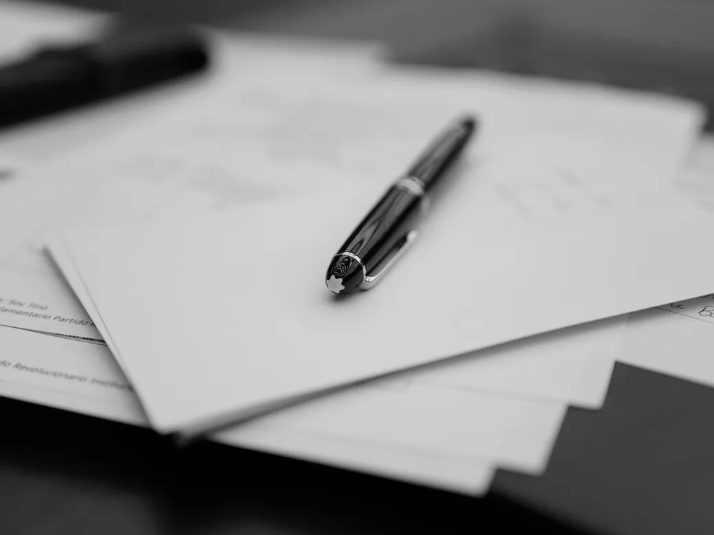 Pen resting on estate-planning documents