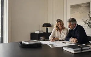 Spouses reviewing a long-term estate plan together