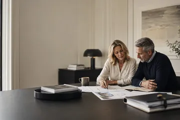 Spouses reviewing a long-term estate plan together